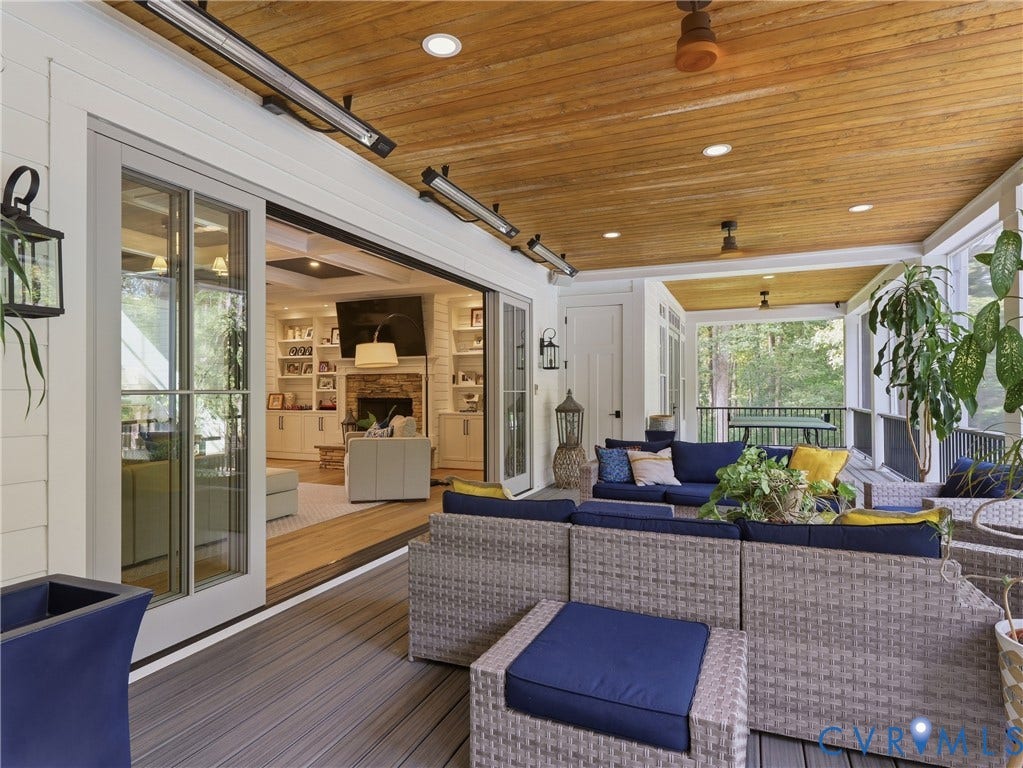 Screened porch featuring a wood-finish plank ceiling, recessed lighting, and ceiling fans