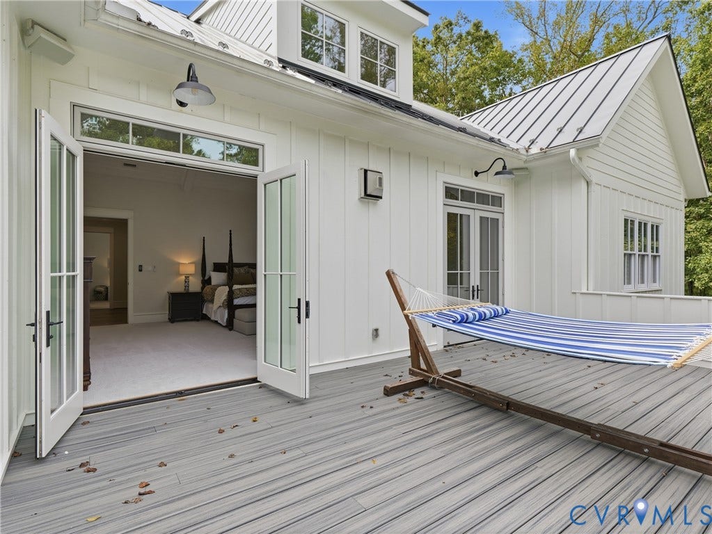 Board and batten exterior with a metal roof
