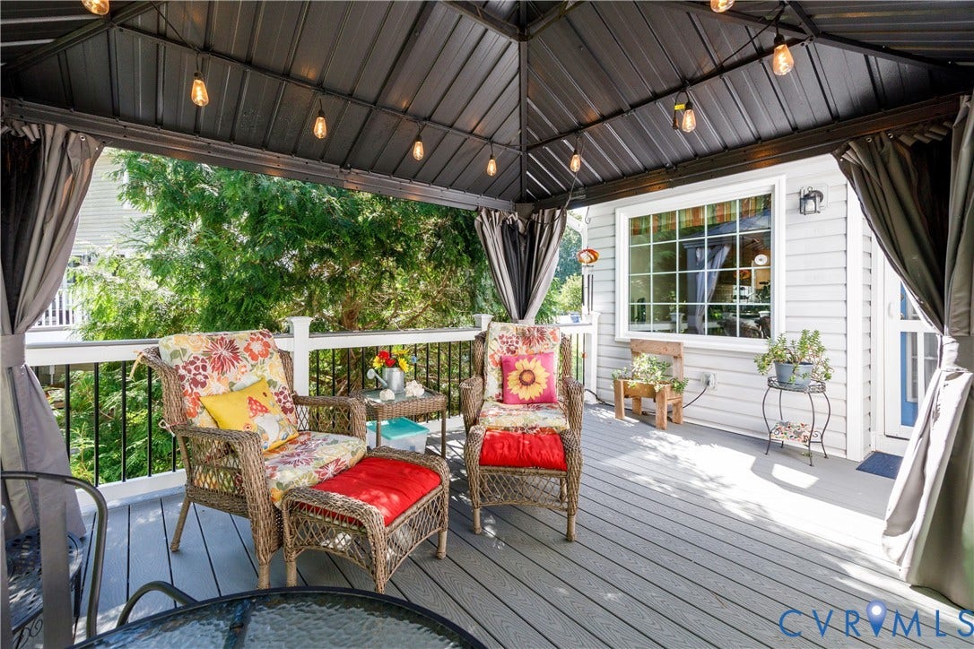 717 McCauliff Drive, Chesterfield, VA 23236 Covered deck featuring a metal gazebo structure, string lighting, and privacy curtains