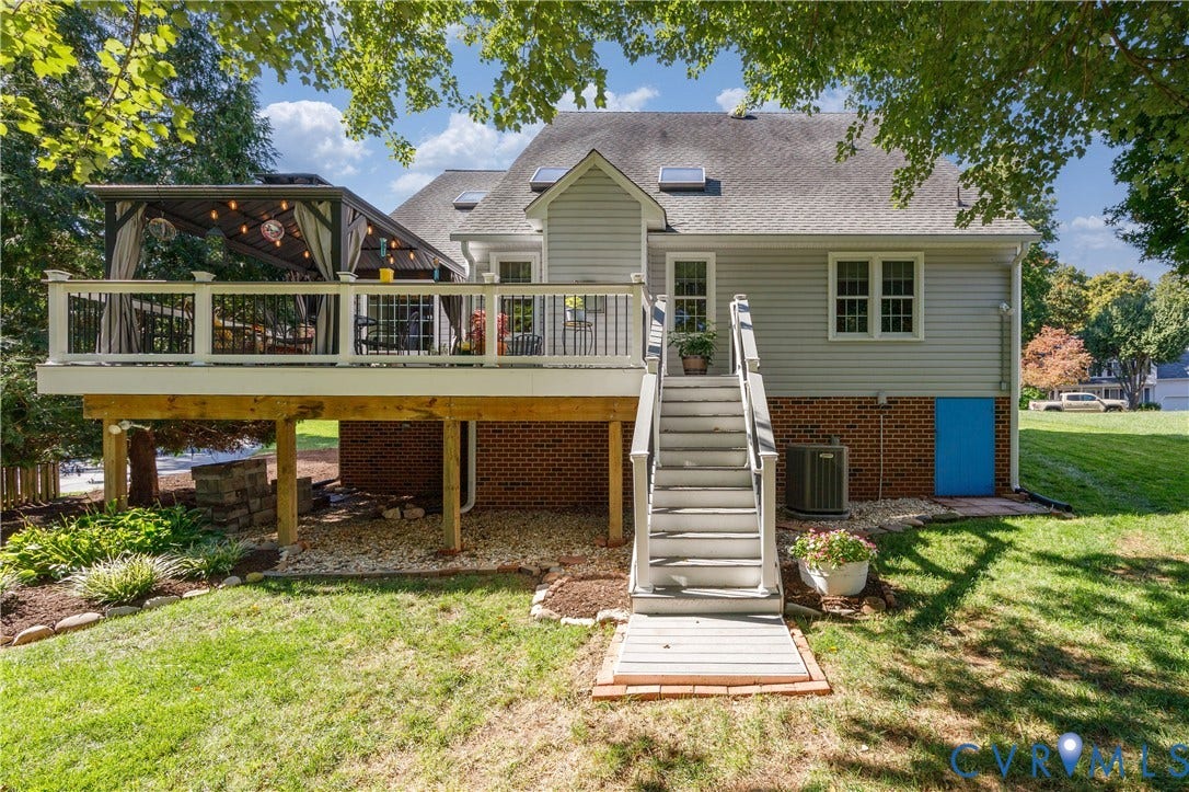 717 McCauliff Drive, Chesterfield, VA 23236 Expansive rear deck with white railing, covered gazebo, and direct backyard access