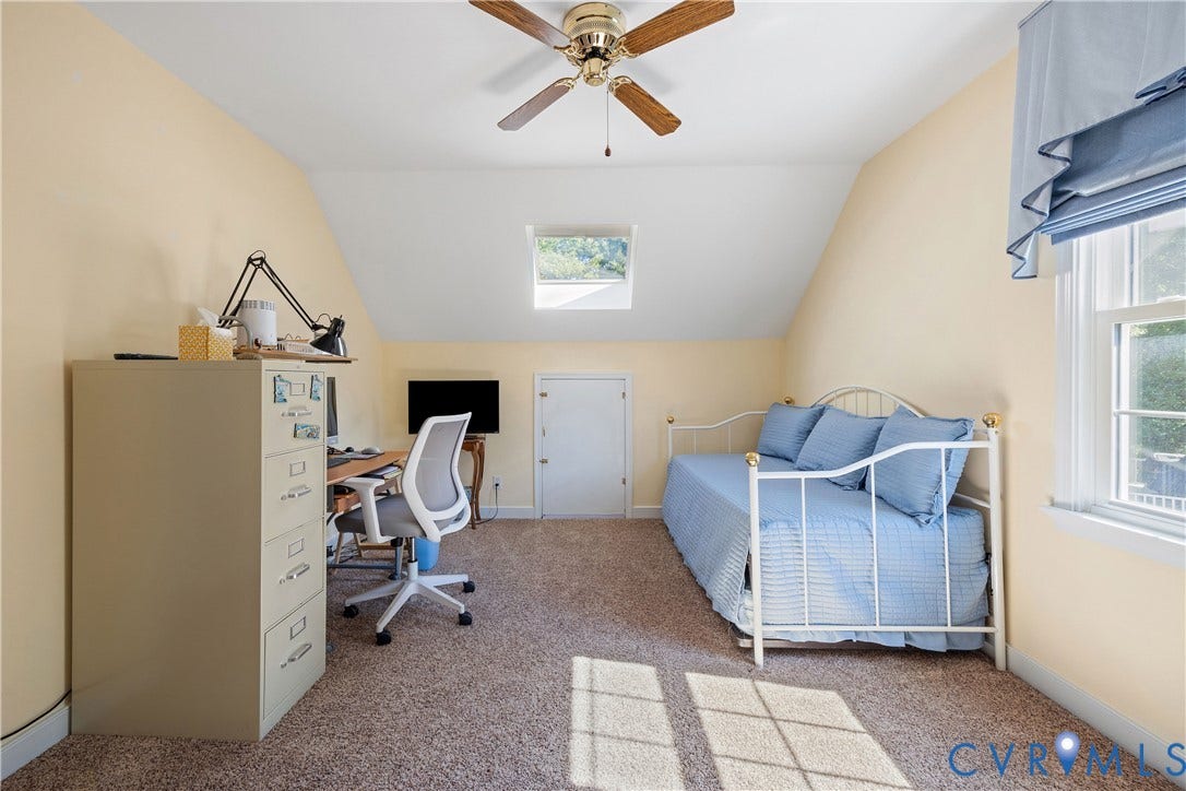 717 McCauliff Drive, Chesterfield, VA 23236 Carpeted room with vaulted ceilings, a skylight, and a ceiling fan