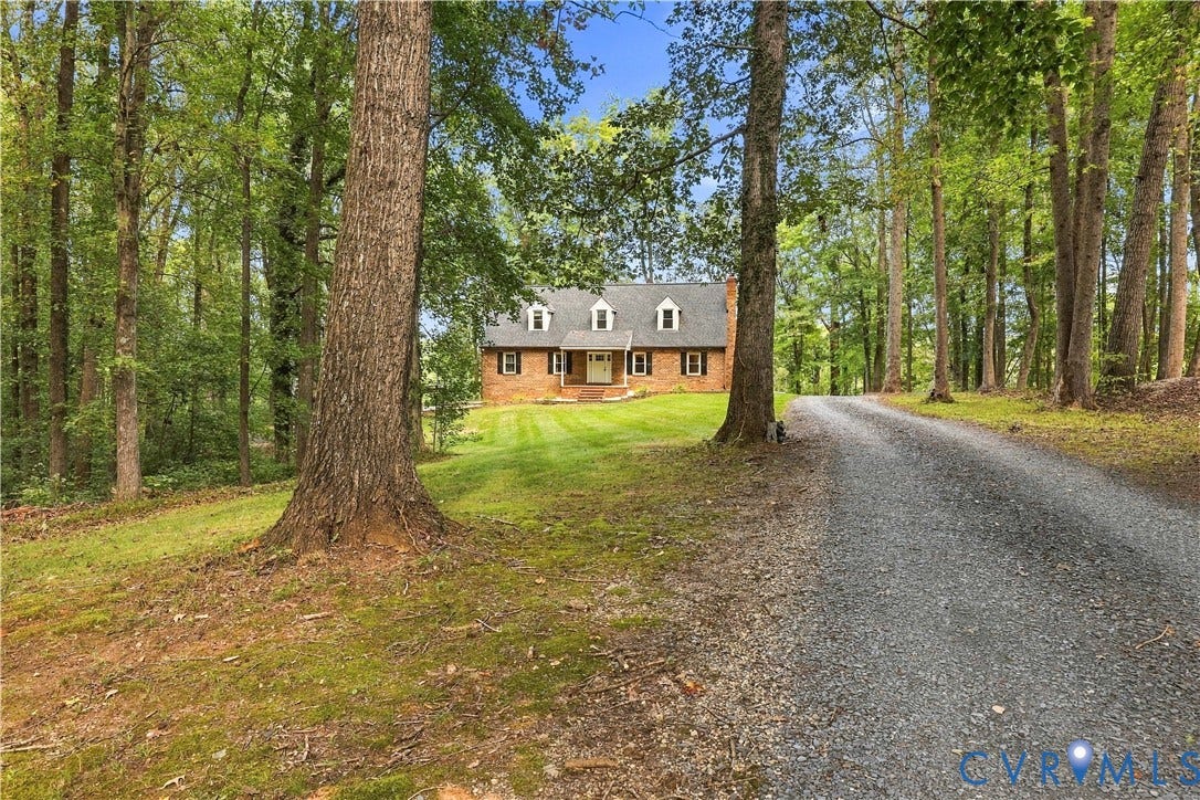 17 River Walk, Cumberland, VA 23027 Brick exterior with a gabled roof and three dormer windows