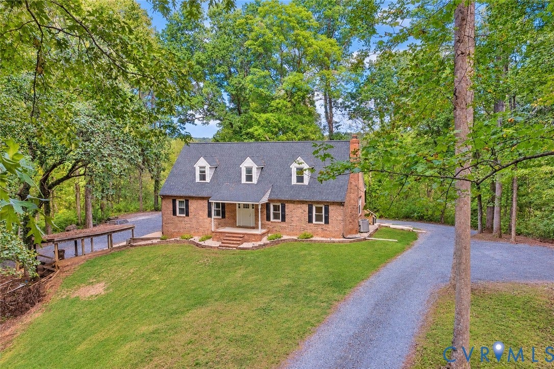 17 River Walk, Cumberland, VA 23027 Brick exterior with a dark-pitched roof and dormer windows