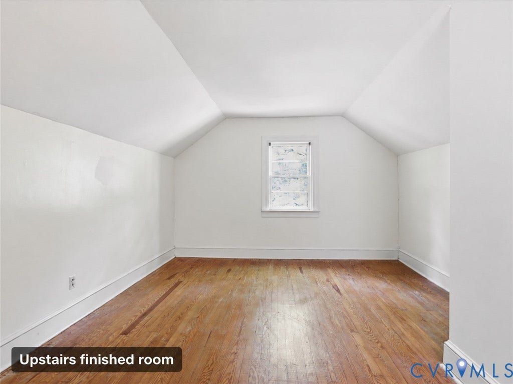 21600 Patrick Henry Highway, Amelia, VA 23083 Finished room featuring wood flooring, sloped ceilings, and a single window