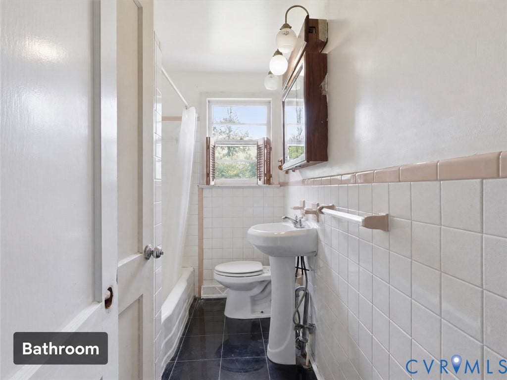 21600 Patrick Henry Highway, Amelia, VA 23083 White ceramic wall tiling with a contrasting accent tile