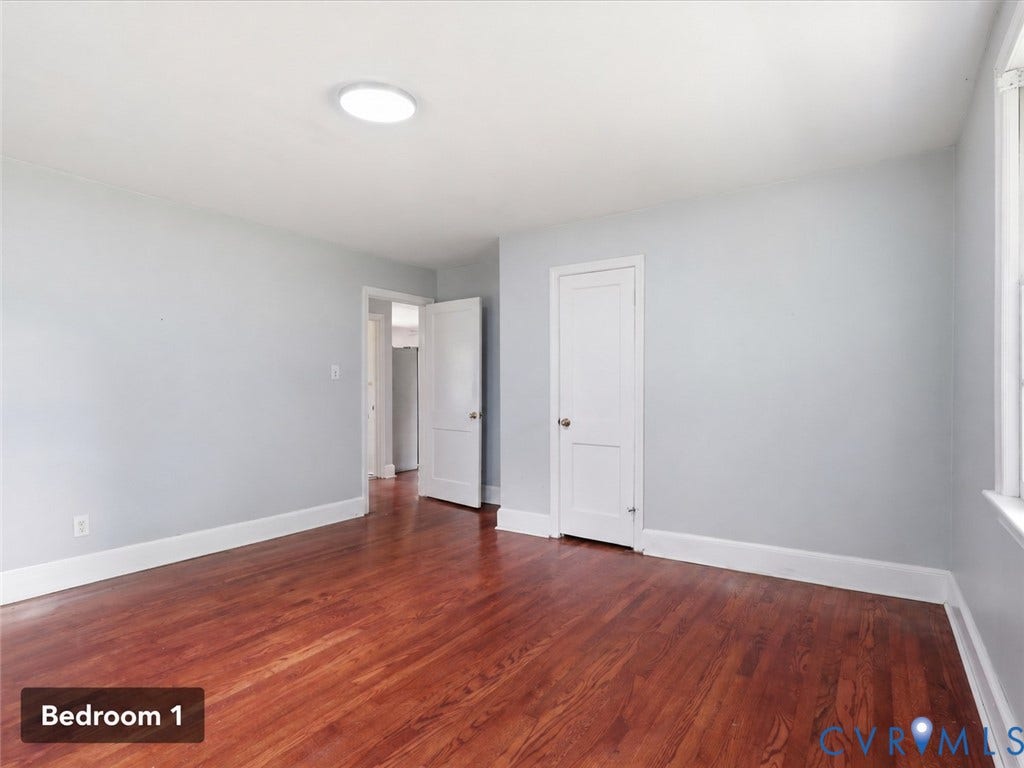 21600 Patrick Henry Highway, Amelia, VA 23083 Hardwood flooring, painted walls, ceiling-mounted light fixture, and white trim