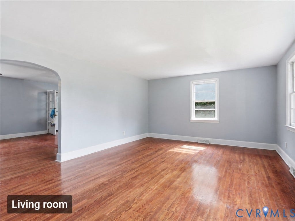21600 Patrick Henry Highway, Amelia, VA 23083 Spacious room featuring wood-finish flooring, light blue walls, and white trim