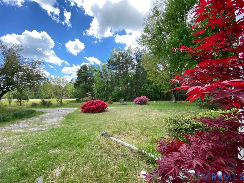 21600 Patrick Henry Highway, Amelia, VA 23083 Expansive green lawn with mature trees and vibrant foliage