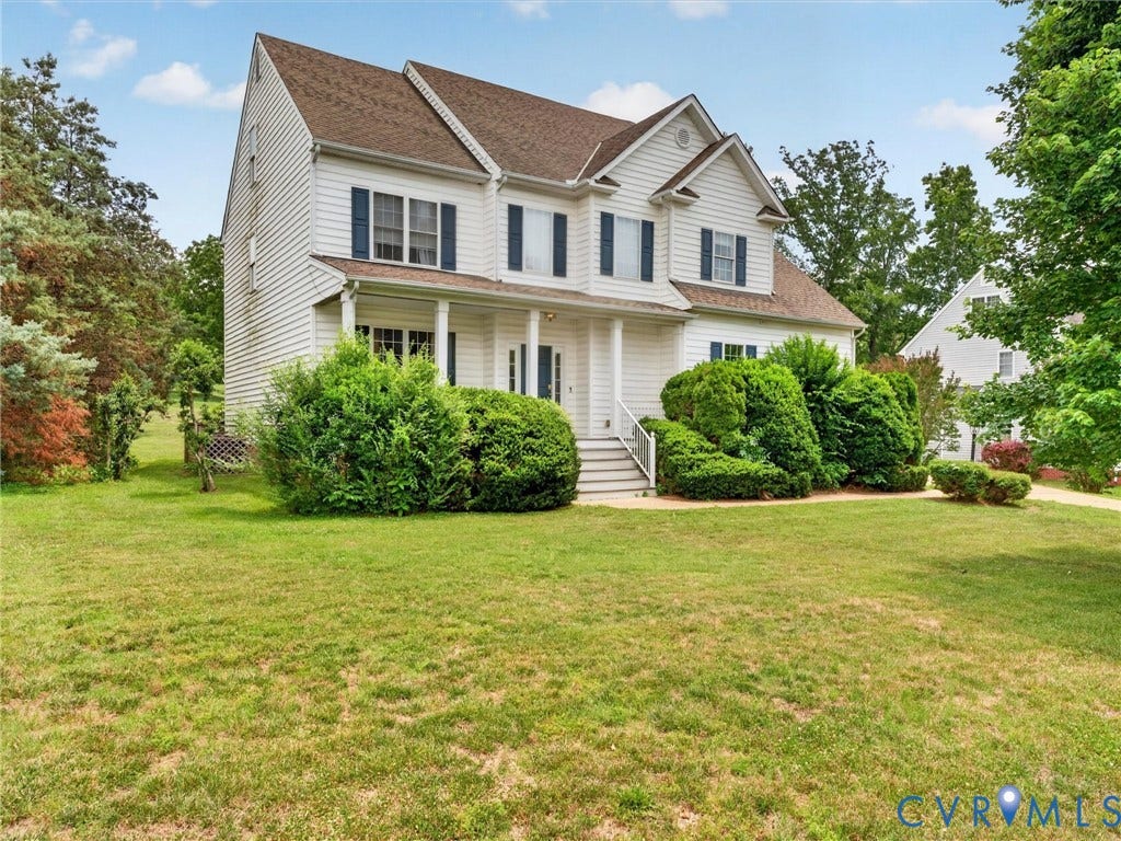 7478 Troub Lane, Elwin Place, Mechanicsville, VA 23111 Two-story residence featuring white siding, a covered front porch, and dark blue window shutters
