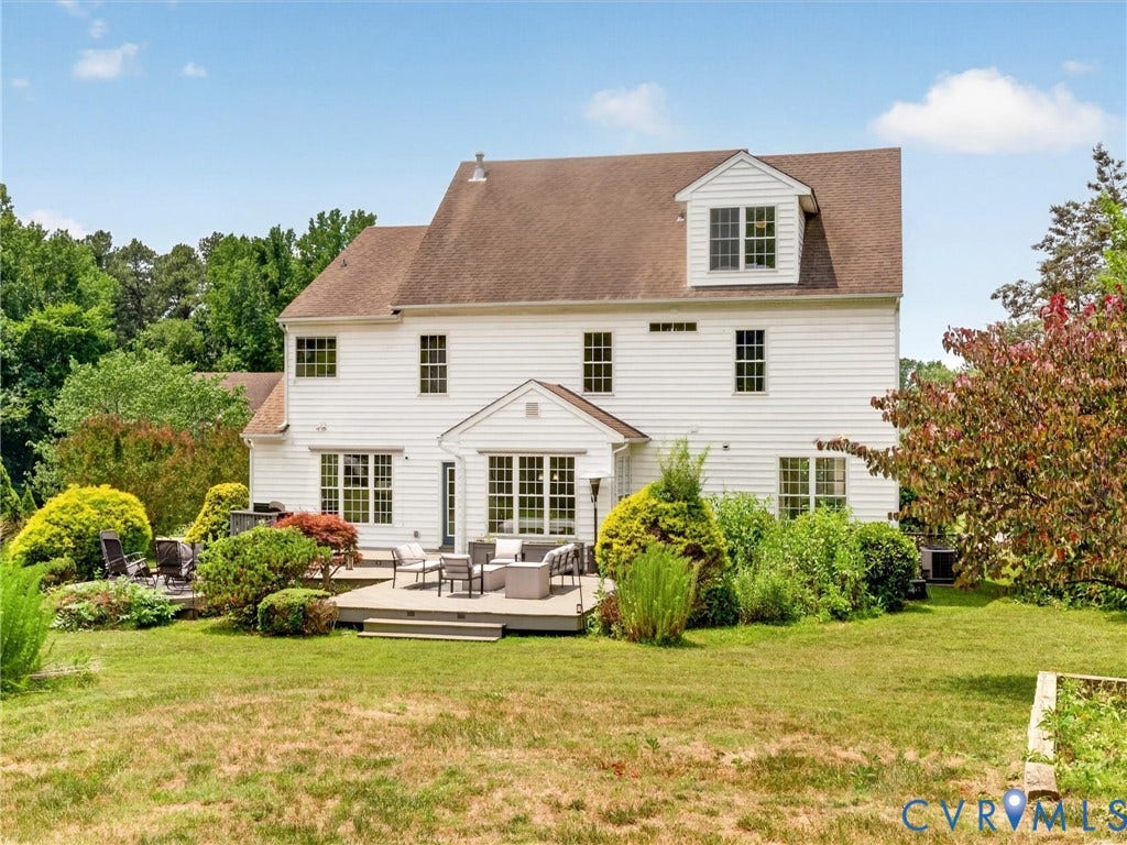 7478 Troub Lane, Elwin Place, Mechanicsville, VA 23111 White siding exterior with multiple windows, dormer window, and a rear deck