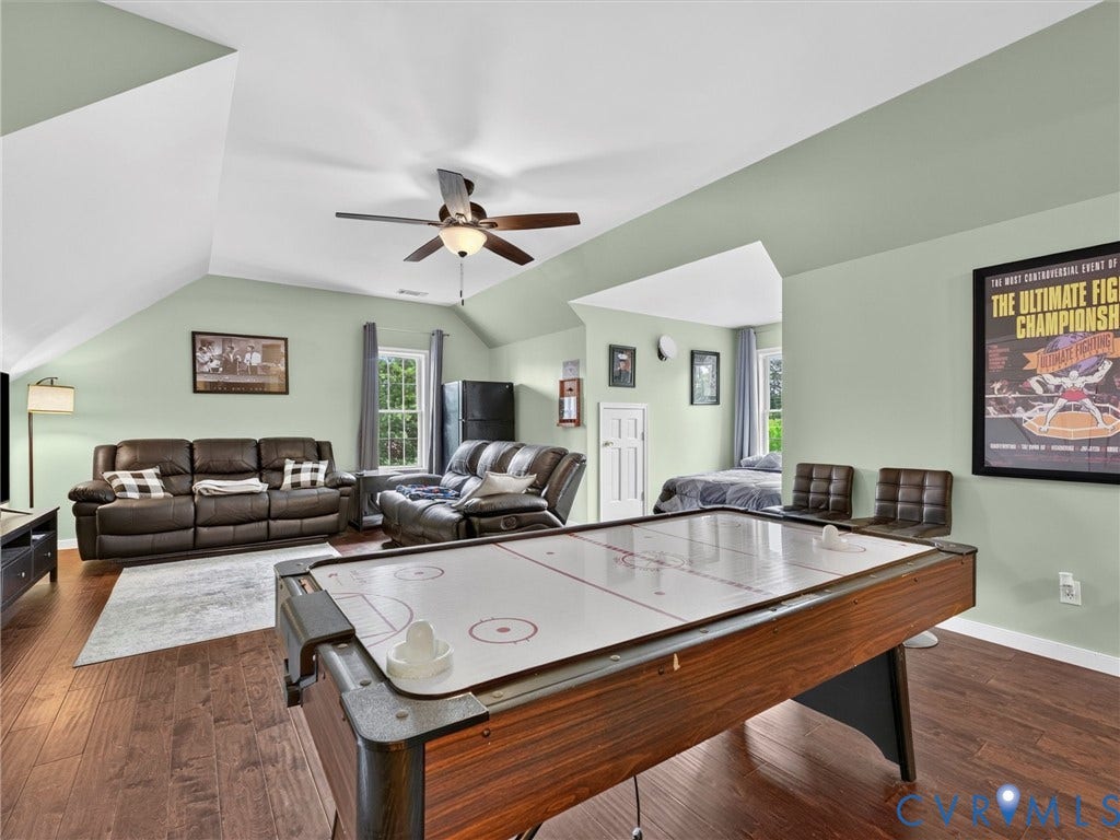 7478 Troub Lane, Elwin Place, Mechanicsville, VA 23111 Vaulted ceiling with a ceiling fan, recessed window, wood-finish flooring, and light green wall paint