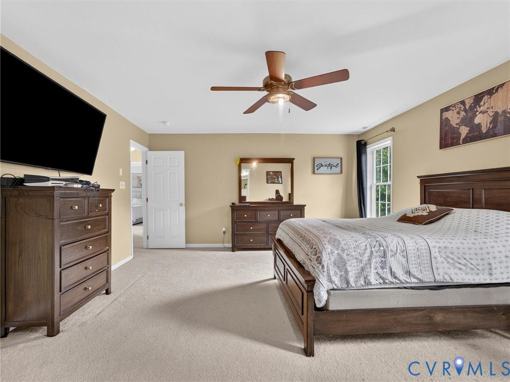 7478 Troub Lane, Elwin Place, Mechanicsville, VA 23111 Wall-to-wall carpeting and a ceiling fan with integrated lighting