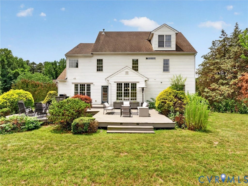 7478 Troub Lane, Elwin Place, Mechanicsville, VA 23111 White siding exterior featuring a multi-level deck and a stone patio