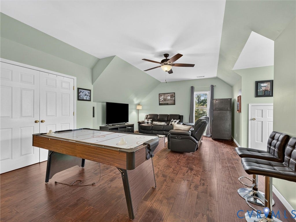 7478 Troub Lane, Elwin Place, Mechanicsville, VA 23111 Vaulted ceiling featuring a ceiling fan, wood-finish flooring, and a single window
