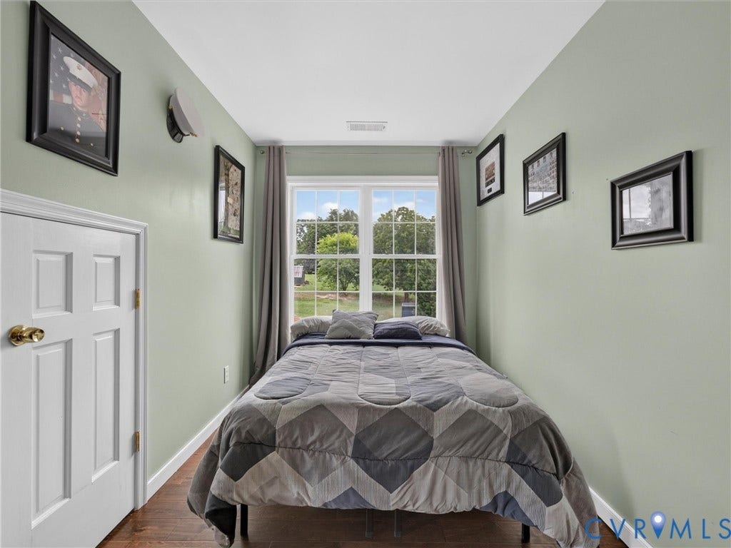 7478 Troub Lane, Elwin Place, Mechanicsville, VA 23111 Hardwood-style flooring with light green wall finishes