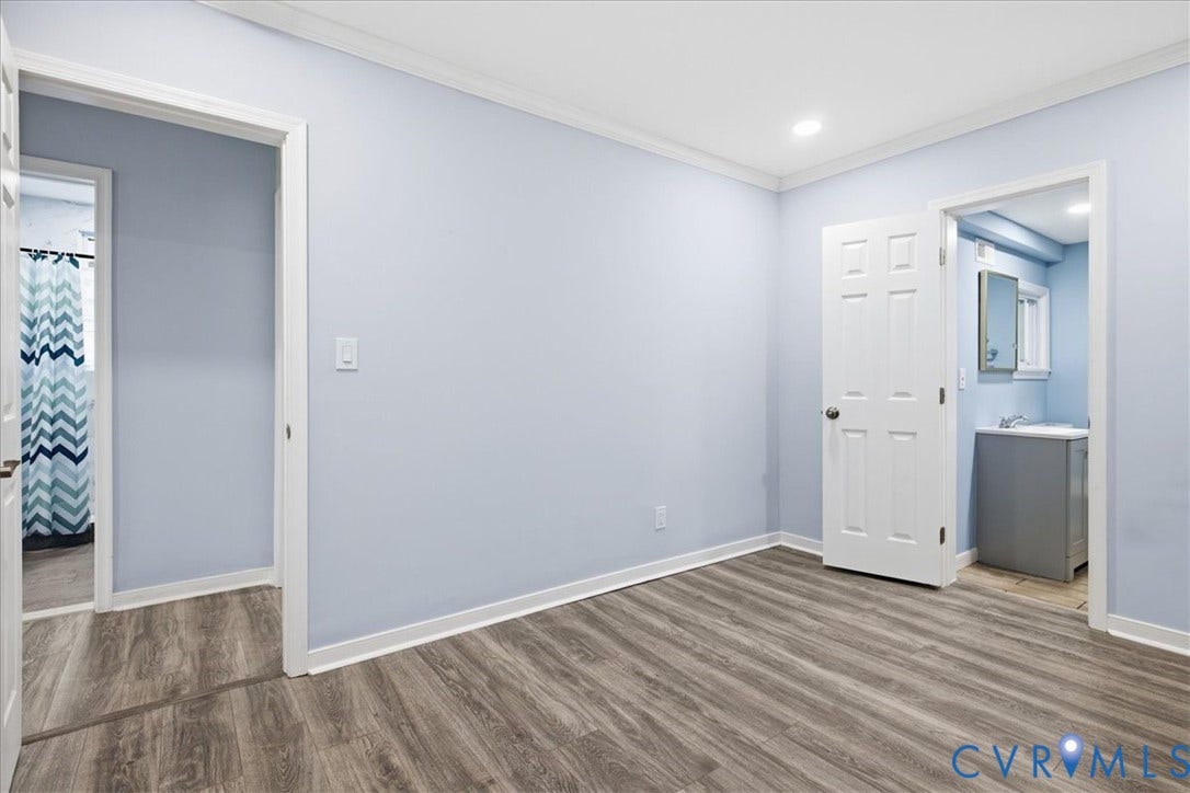 1630 W Washington Street, Petersburg, VA 23803 Wood-finish flooring, recessed lighting, crown molding, and white trim