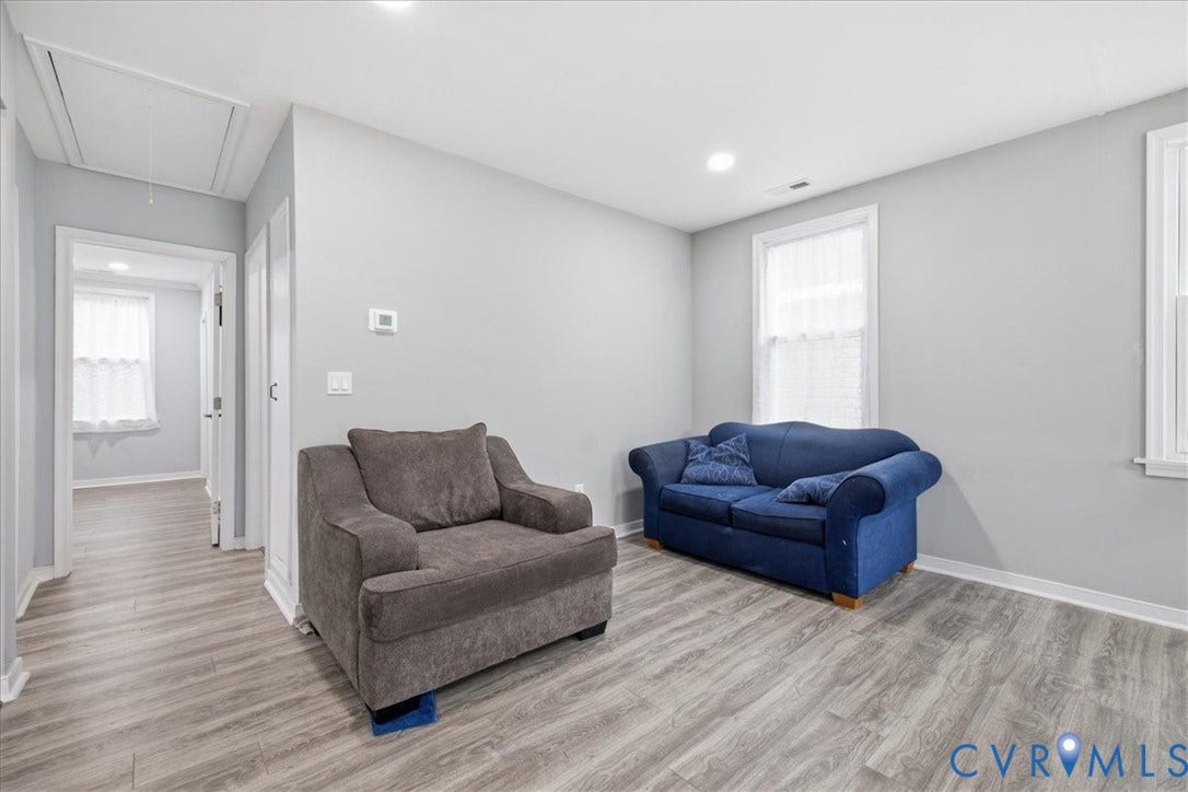 1630 W Washington Street, Petersburg, VA 23803 Wood-finish flooring, recessed lighting, and multiple windows