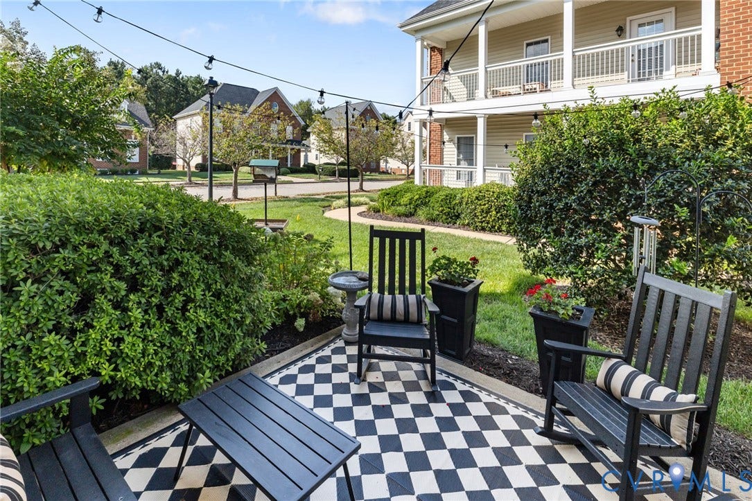 Paved patio featuring a checkerboard pattern