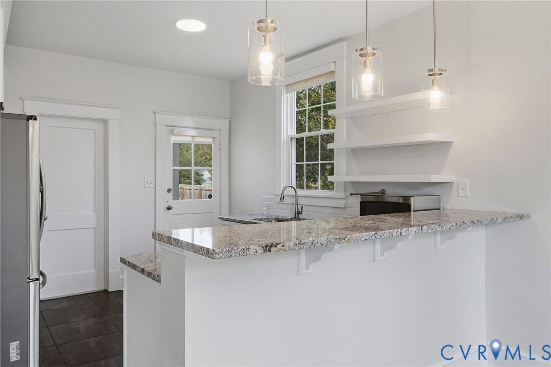 2900 Seminary Avenue, Northside, Richmond, VA 23220 Granite countertop bar, great for entertaining and open flow.