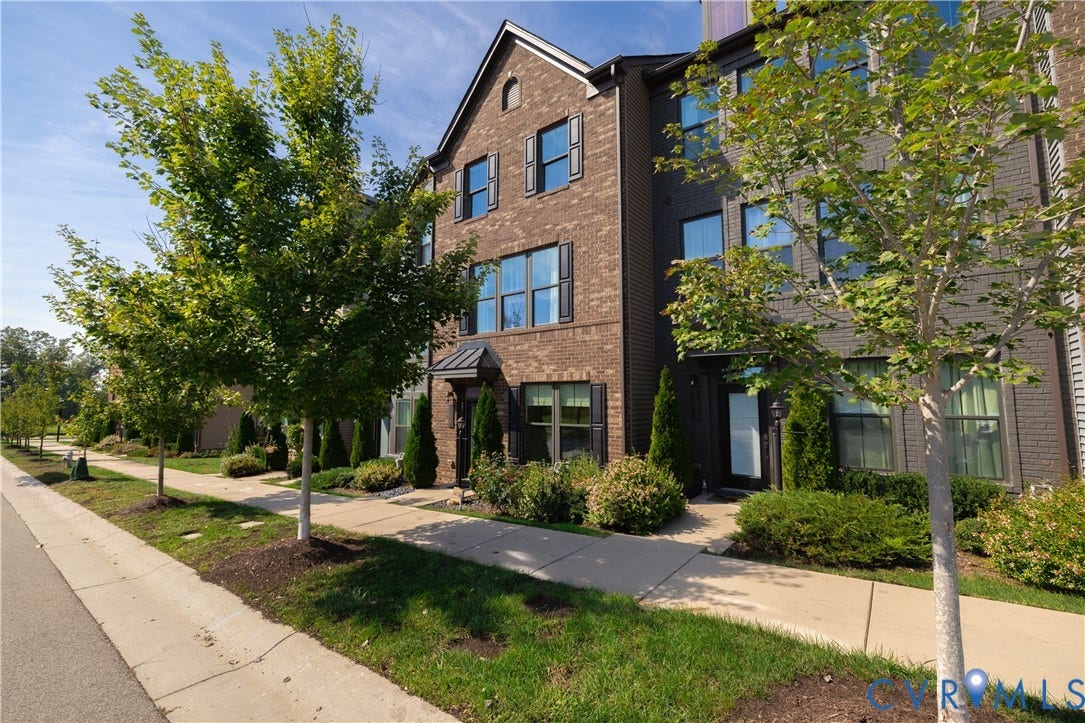 14336 Altavista Boulevard, Midlothian, VA 23114 Brick exterior with dark shutters, established landscaping, and a covered entry