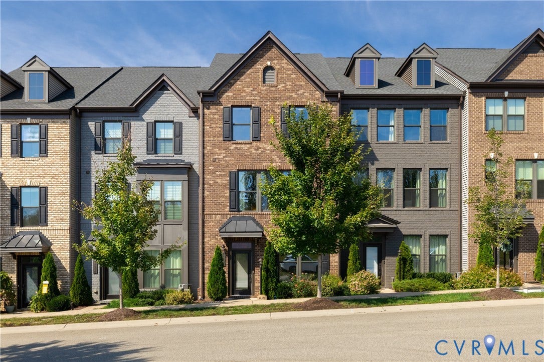14336 Altavista Boulevard, Midlothian, VA 23114 Brick and stucco facade with multiple window styles, dormer windows, and covered entryways