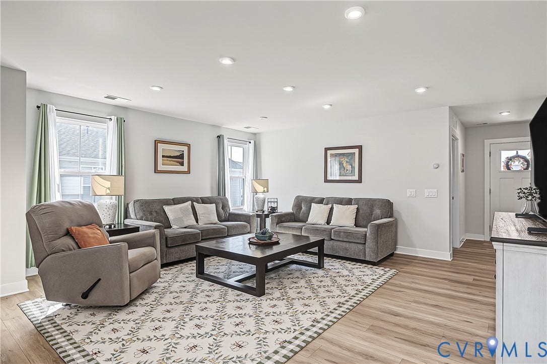7490 E Danube Loop, The Groves, New Kent, VA 23124 Light-filled living area with generous space for comfortable everyday living