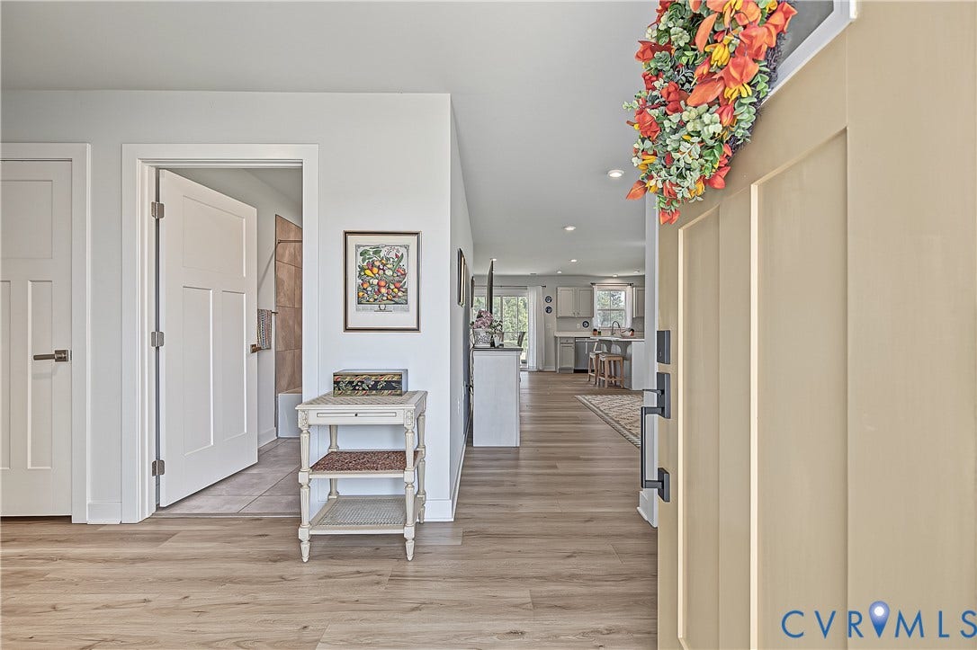 7490 E Danube Loop, The Groves, New Kent, VA 23124 Welcoming entry opens directly into the home's bright, open-concept living spaces