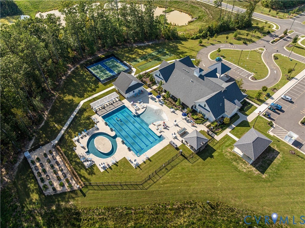 7490 E Danube Loop, The Groves, New Kent, VA 23124 Amenities include two pools, two fitness centers, two clubhouses, pickleball courts, walking trails, and more. Join a social club or participate in annual events, all steps away from your front door.
