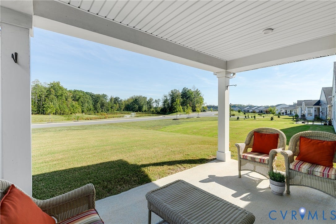 7490 E Danube Loop, The Groves, New Kent, VA 23124 Covered back patio overlooking peaceful pond and green space