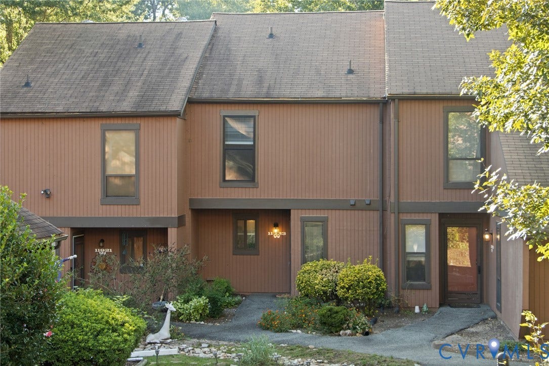 Brown vertical siding exterior with contrasting trim