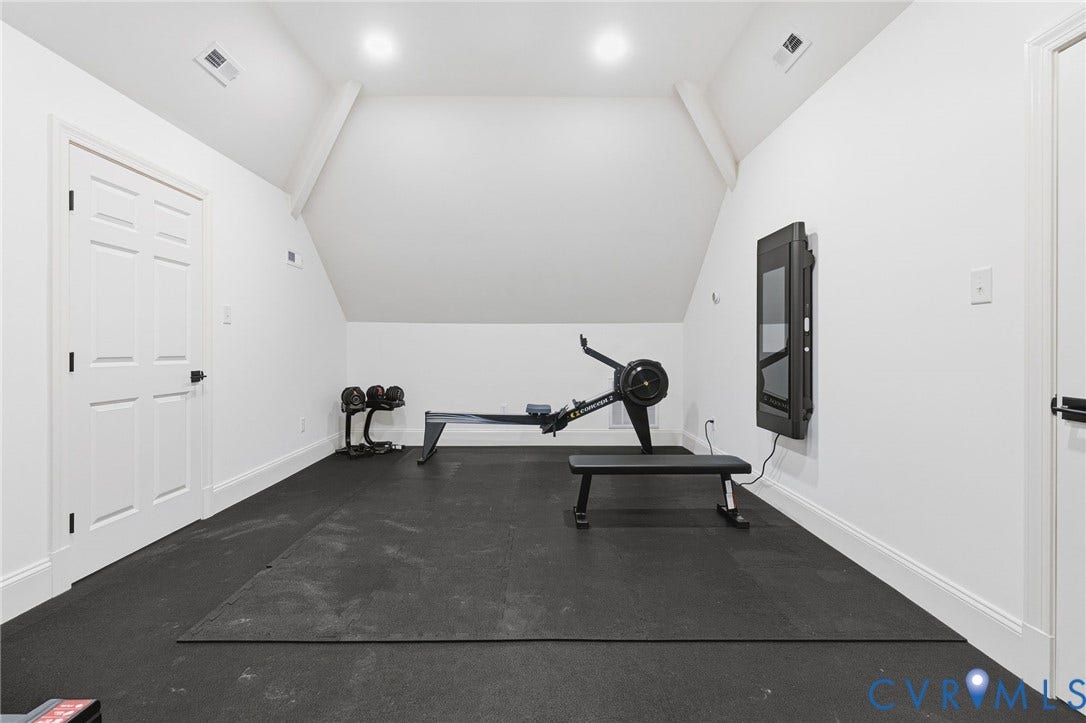 3808 Barrington Branch Court, Henrico, VA 23233 Recessed ceiling lighting, white paneled doors, wall-mounted display, and sloped ceiling