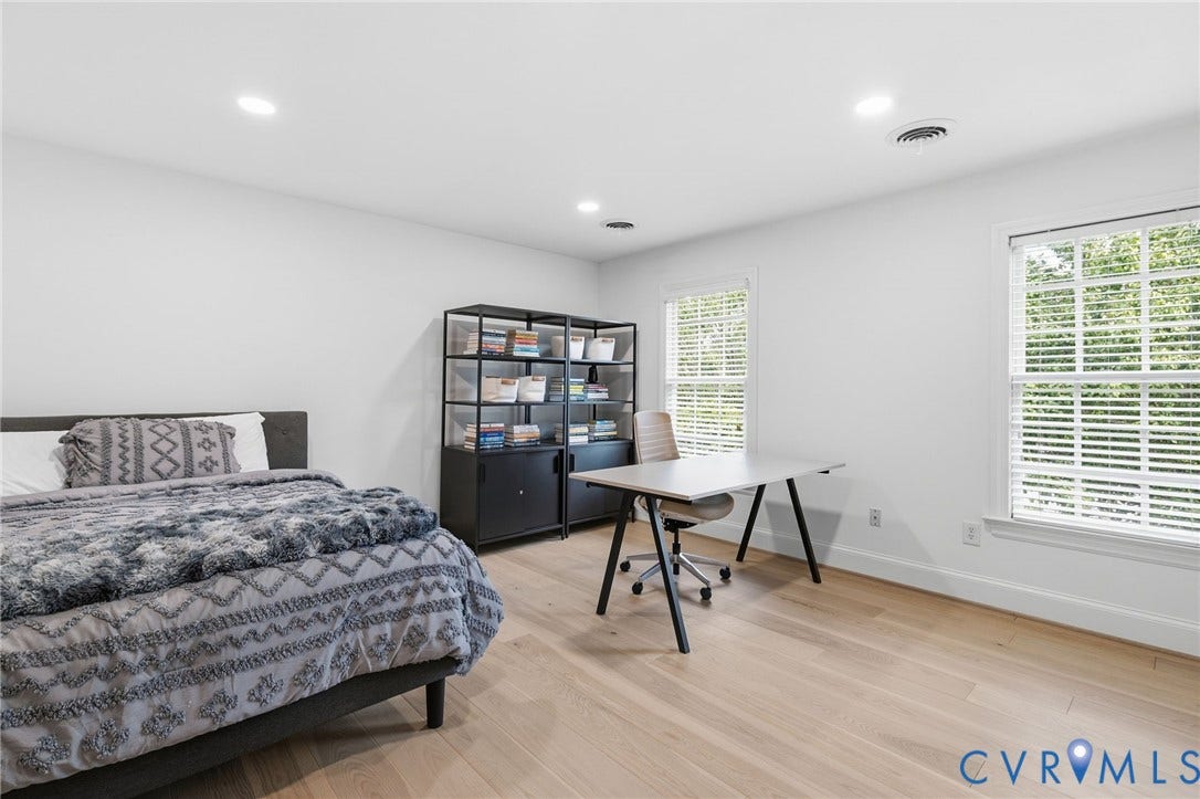 3808 Barrington Branch Court, Henrico, VA 23233 Light wood-finish flooring, recessed ceiling lighting, and two windows with white blinds