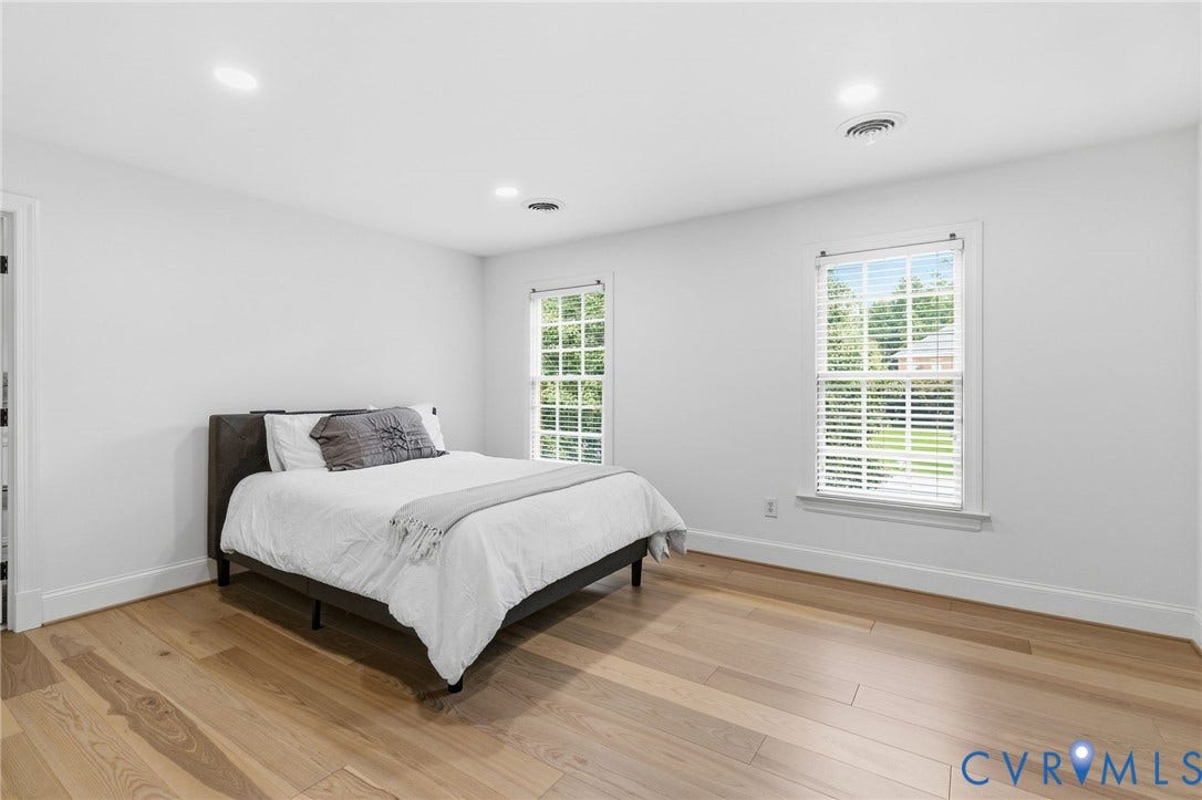 3808 Barrington Branch Court, Henrico, VA 23233 Hardwood flooring, recessed ceiling lighting, and two windows with blinds