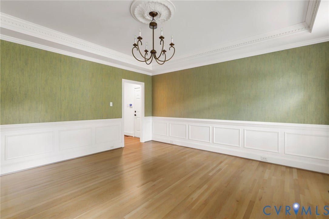 3808 Barrington Branch Court, Henrico, VA 23233 Hardwood flooring, decorative crown molding, wainscoting, and a ceiling medallion with a chandelier