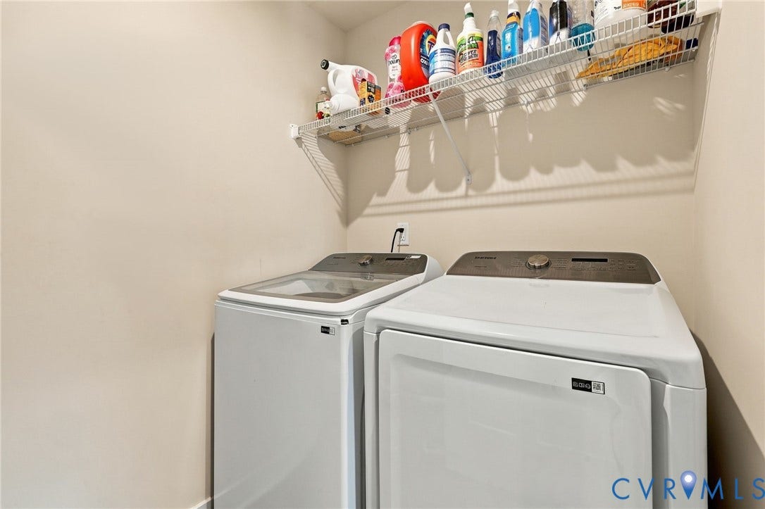 Convenient utility area featuring a wire storage shelf