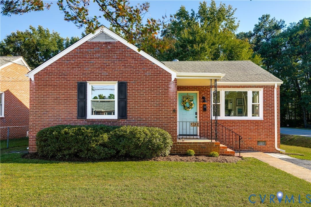 Brick ranch home with newer windows (2023) and new gutters (2026)