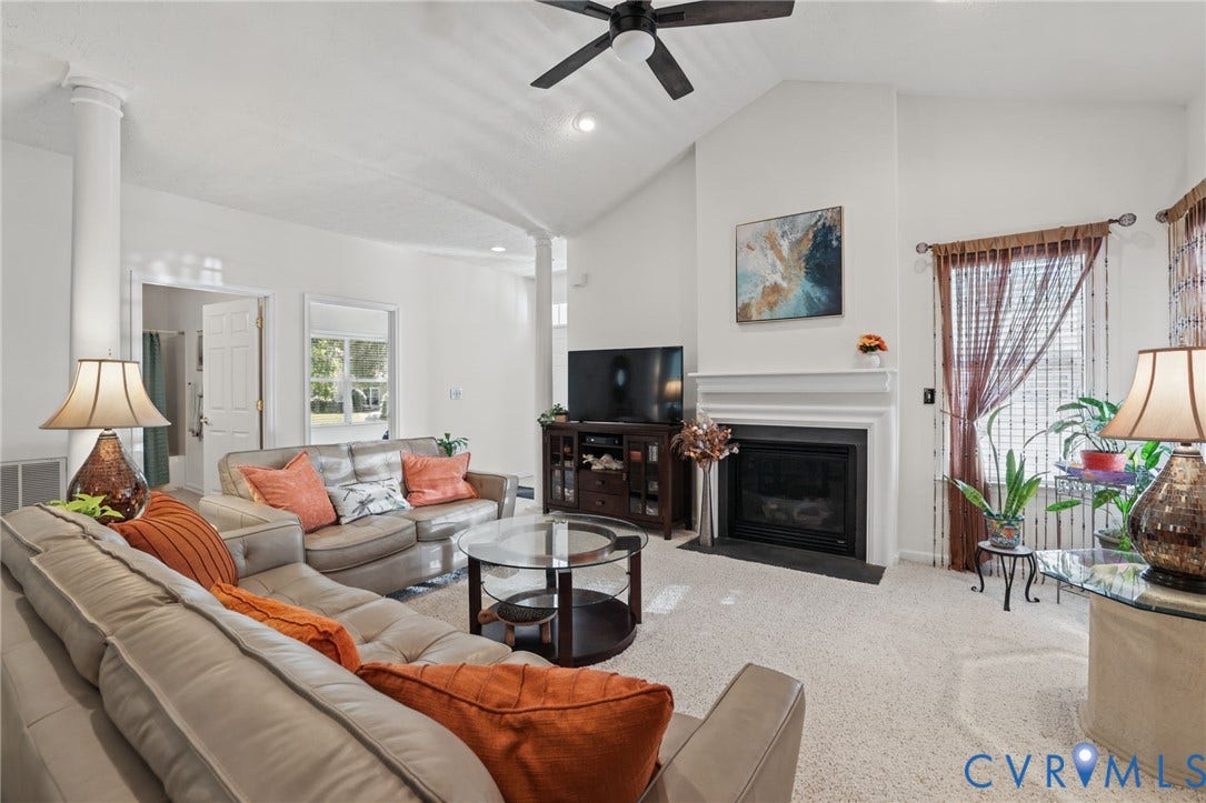 251 Pumpkin Place, Harvest Glen, North Chesterfield, VA 23236 Bright, open living area featuring vaulted ceilings, ceiling fan, and abundant natural light from multiple windows