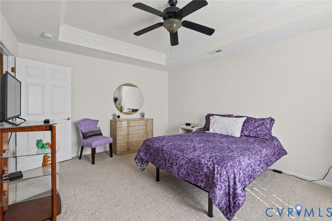 251 Pumpkin Place, Harvest Glen, North Chesterfield, VA 23236 Tray ceiling with crown molding, ceiling fan, and light-toned carpet