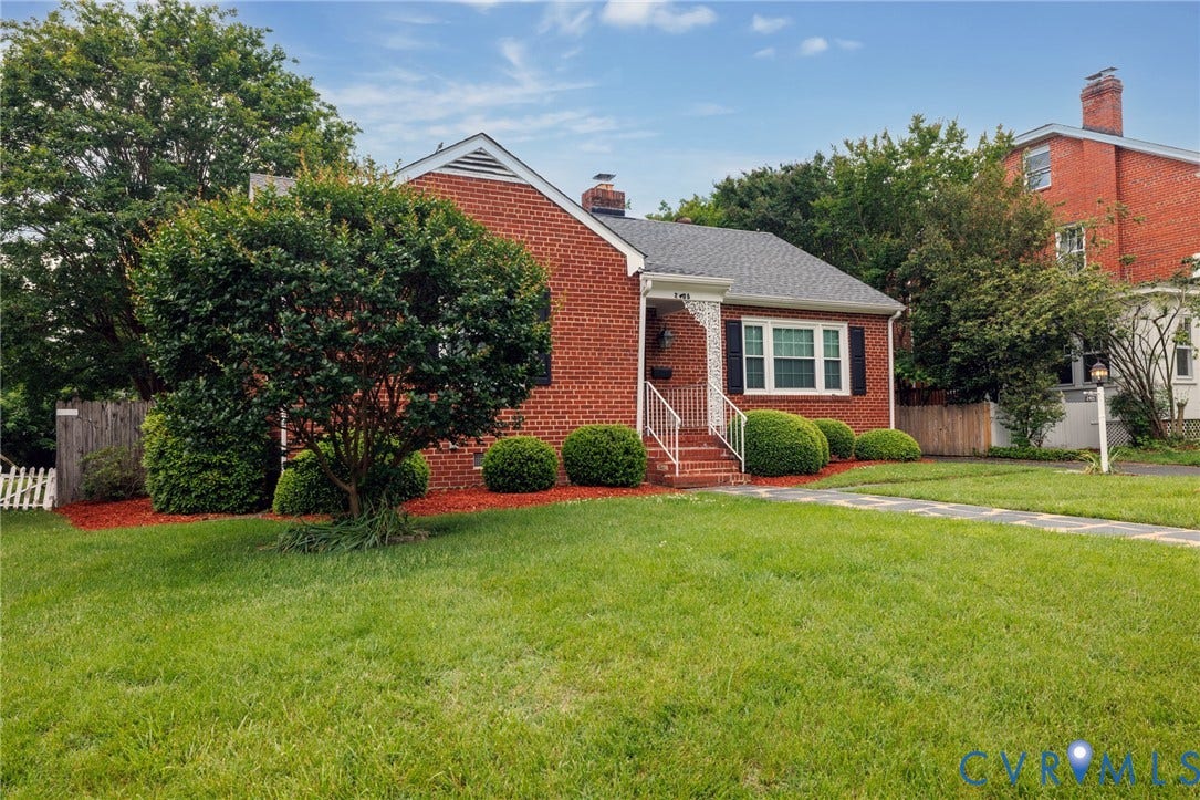 2405 Dumbarton Road, Henrico, VA 23228 Brick exterior with white trim, covered entryway, and a gabled roof