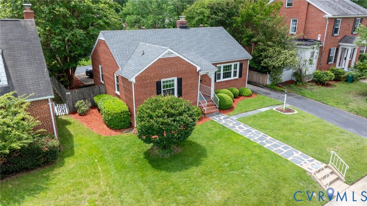 2405 Dumbarton Road, Henrico, VA 23228 Brick exterior with a gray shingled roof