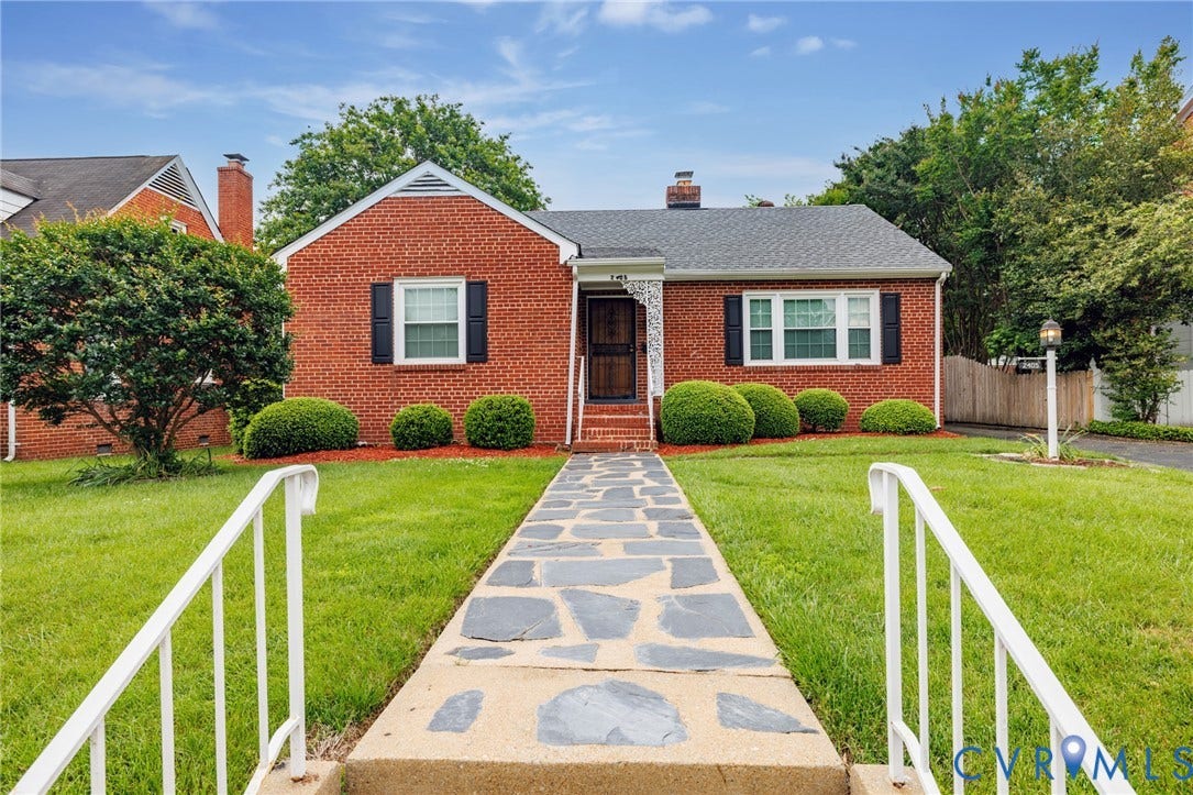 2405 Dumbarton Road, Henrico, VA 23228 Brick exterior with black shutters and a gray shingle roof