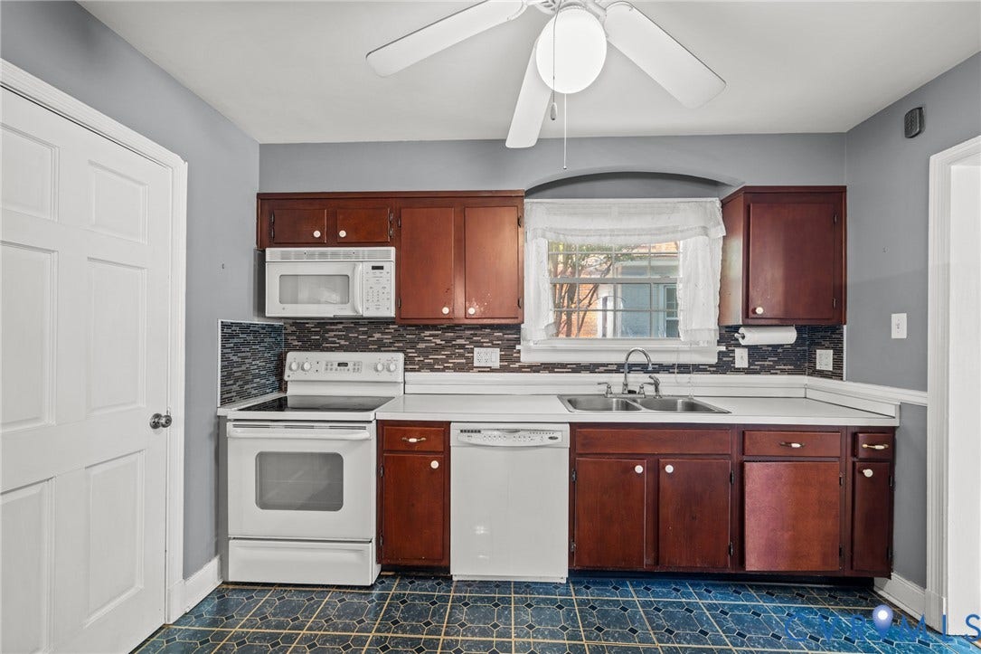 2405 Dumbarton Road, Henrico, VA 23228 Kitchen featuring wood-finish cabinetry, white countertops, and a mosaic tile backsplash