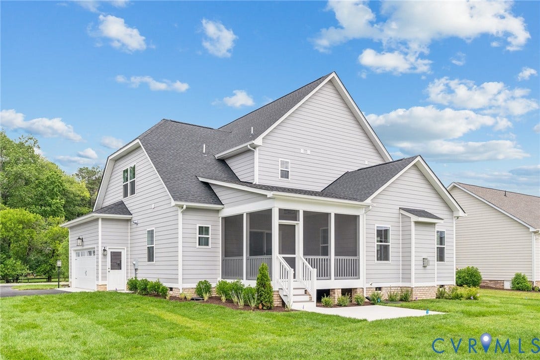 9116 TERROIR Lane, Viniterra Villas, New Kent, VA 23124 Multi-level exterior with light gray siding and dark shingle roofing