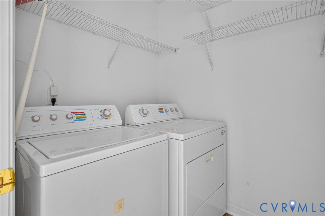 Laundry area featuring white wire shelving