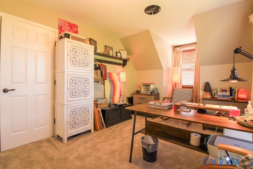 511 Riverview Court, Chester, VA 23836 Sloped ceilings, neutral wall paint, and carpeted flooring