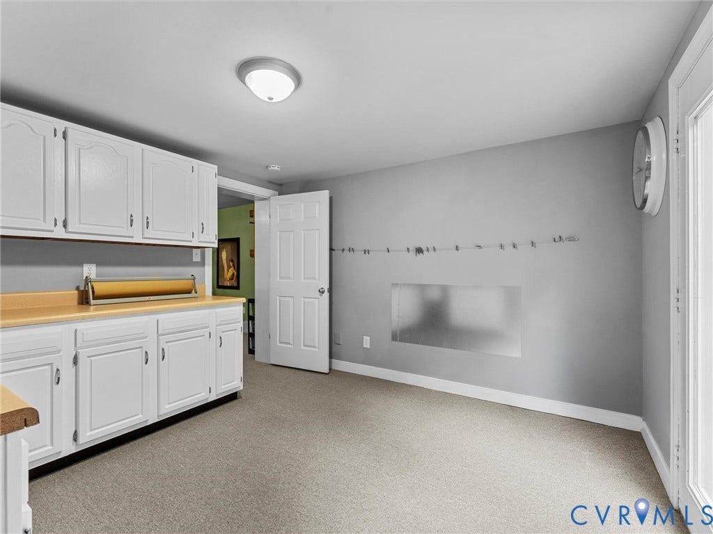 12100 English Ivy Lane, Glen Allen, VA 23059 Room featuring white cabinetry, wood-finish countertops, wall-to-wall carpeting, and a flush-mount ceiling light