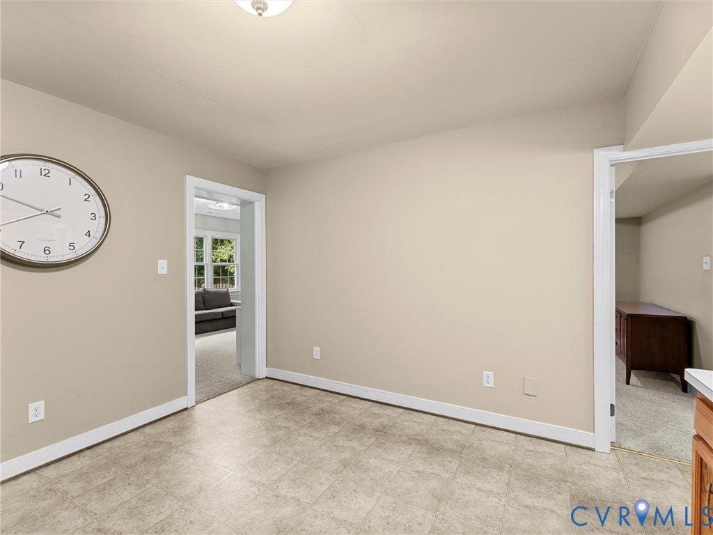 12100 English Ivy Lane, Glen Allen, VA 23059 Interior space featuring neutral wall paint, tile flooring, and white door casings