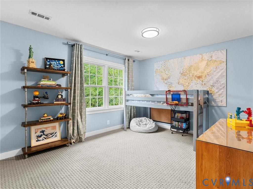 12100 English Ivy Lane, Glen Allen, VA 23059 Neutral interior featuring wall-to-wall carpeting, a dual-pane window with grid muntins, and a ceiling-mounted light fixture