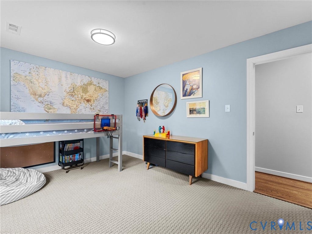 12100 English Ivy Lane, Glen Allen, VA 23059 Neutral-toned carpeting, flush-mount circular lighting, and smooth-finish walls