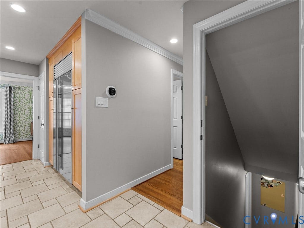 12100 English Ivy Lane, Glen Allen, VA 23059 Built-in floor-to-ceiling cabinetry, recessed lighting, tile flooring, crown molding, and hardwood flooring